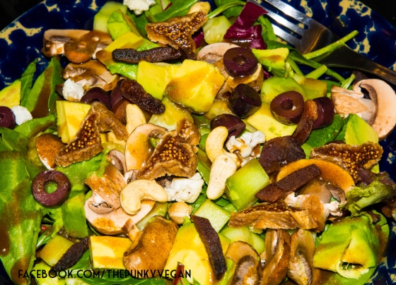 1-5     Organic mixed greens, avocado, mushrooms, olives, cashews, dried sliced figs and apricots with a ginger dressing.